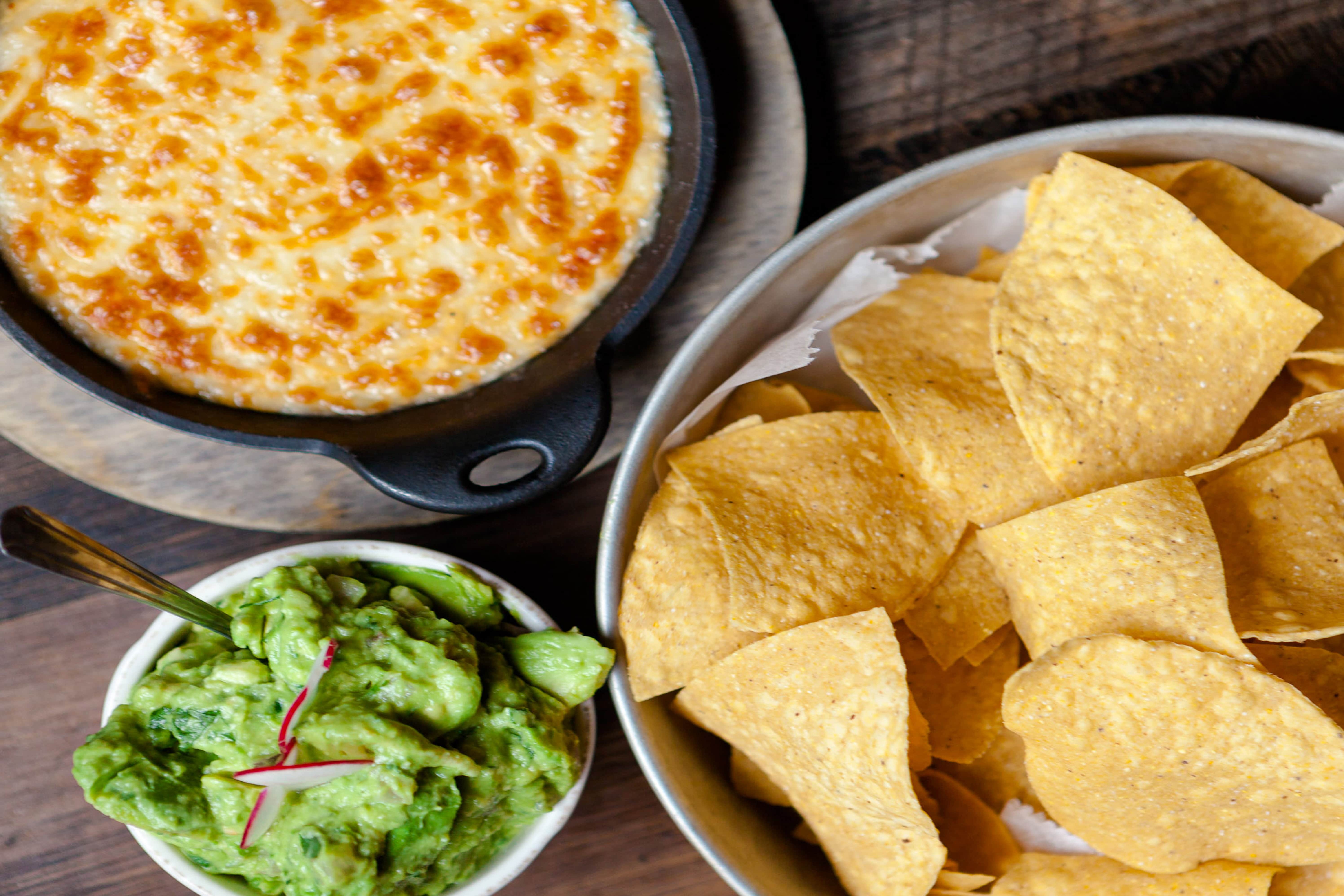 Guac, queso, and chips